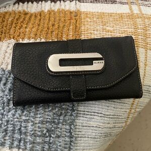 GUESS Black Pebbled Leather Clutch Wallet with Silver Accent
